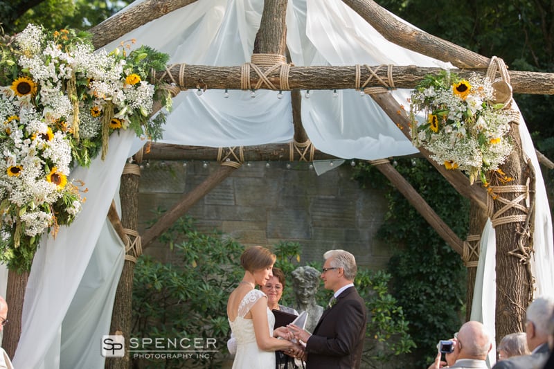  wedding ceremony under arbor