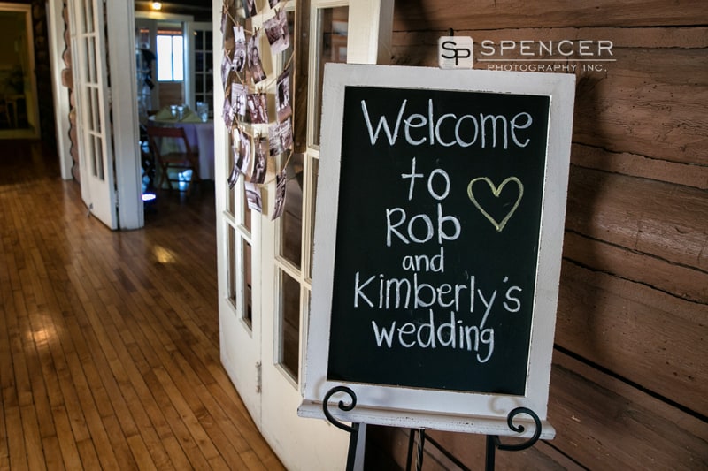 wedding reception sign at vermilion on the lake clubhouse