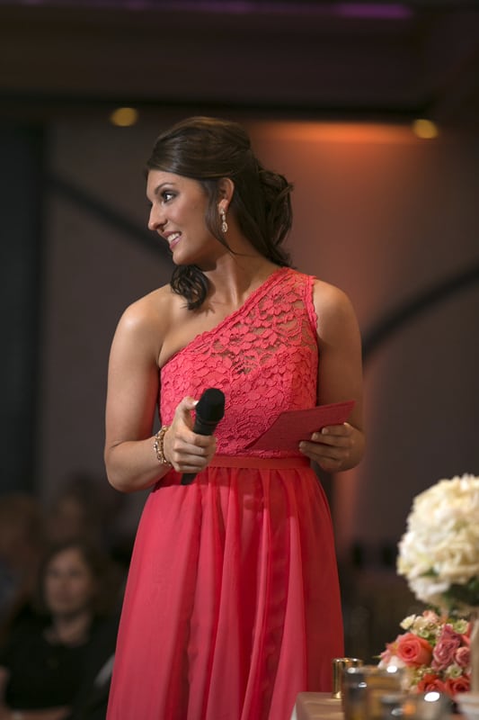 maid of honor giving speech at wedding reception