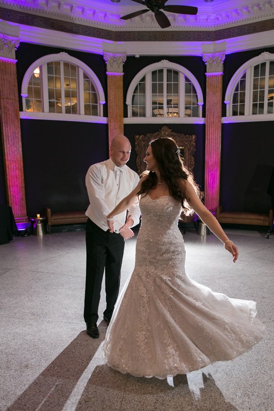 bride and groom dancing at their wedding reception at ballroom at park lane