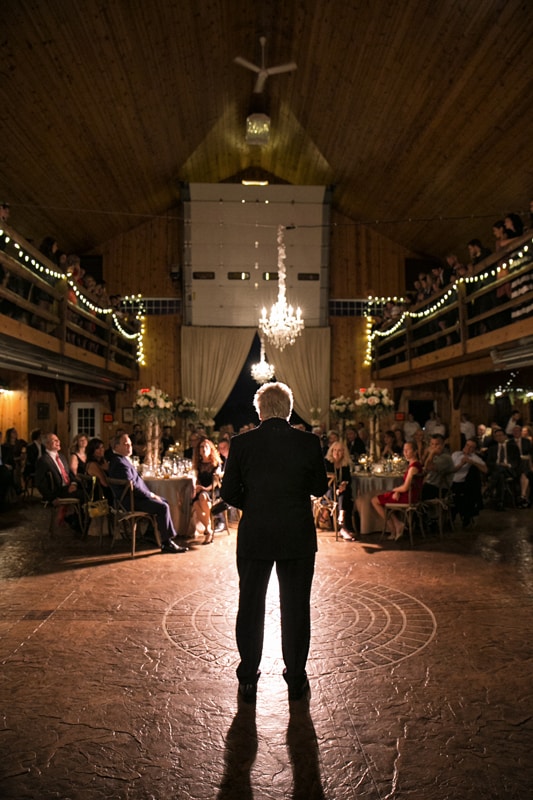 father of the bride giving wedding reception speech
