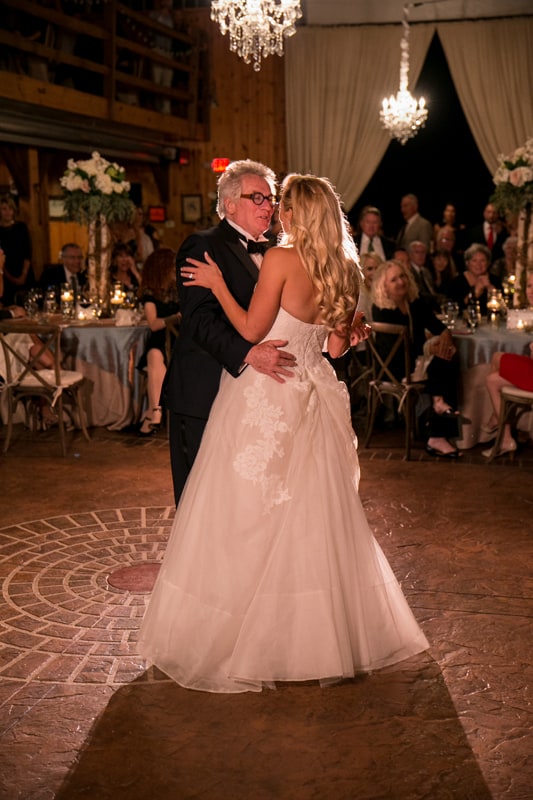 father dances with with daughter at her wedding reception in copley