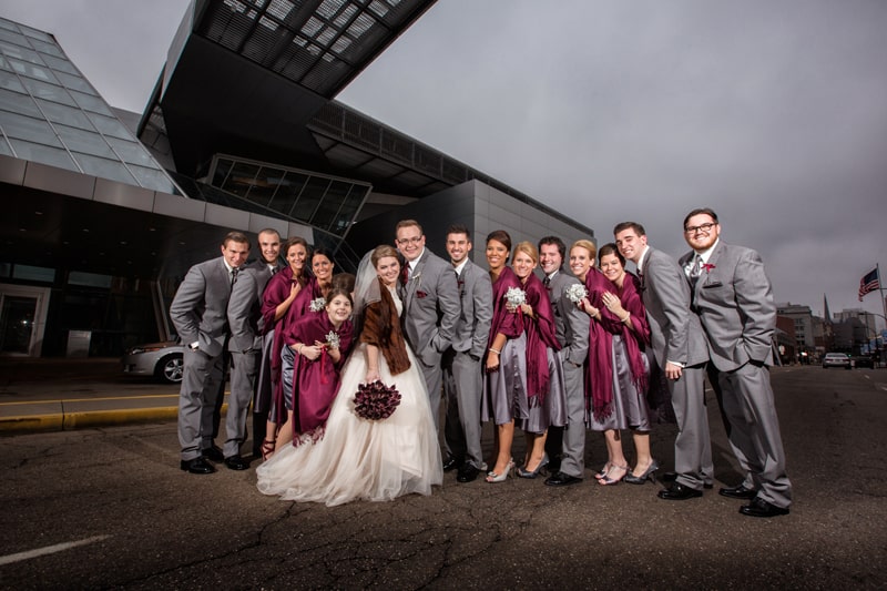 bridal party in front of akron art museum wedding reception