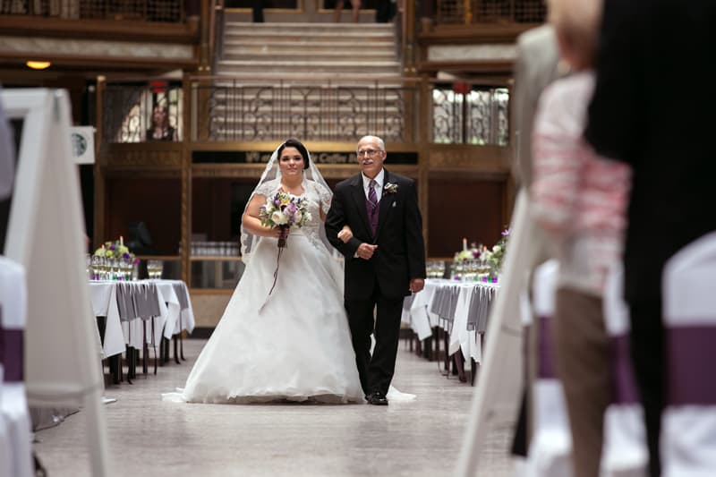 bride approaching her wedding at cleveland arcade