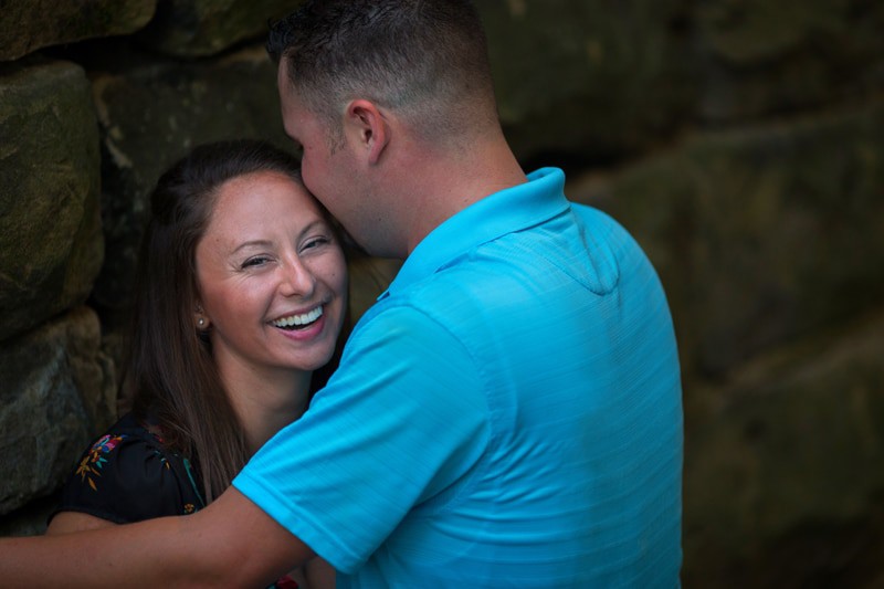 couple laughing at their engagement session in akron