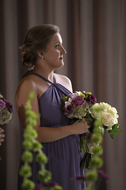 maid of honor holding flowers