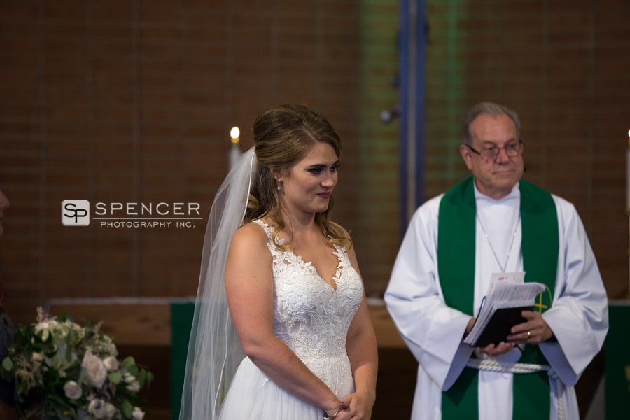 bride watching wedding ceremony speech