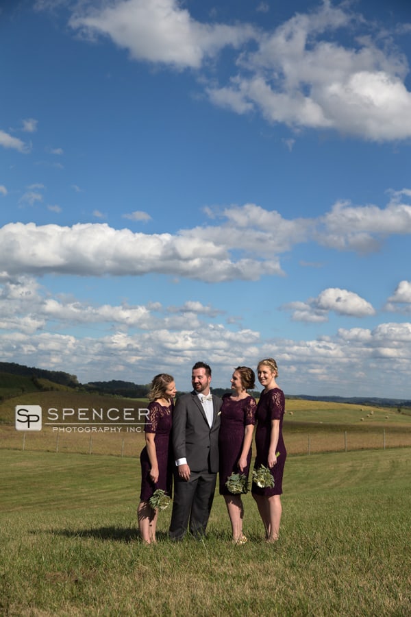  bridesmaids with groom at breitenbach