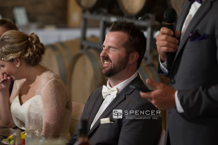 groom reacts to best man at reception at breitenbach