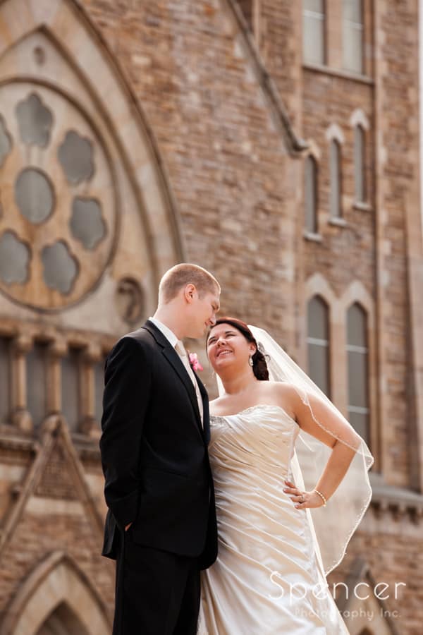 bride and groom in front of church in Canton
