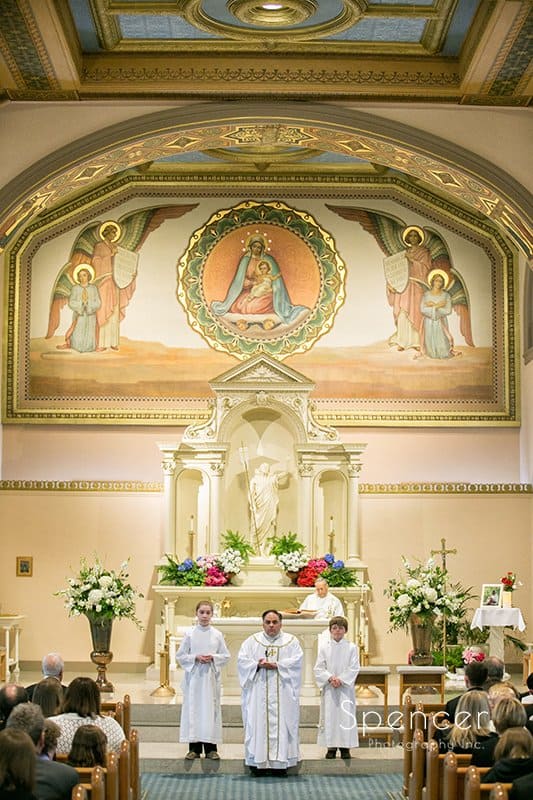  dramatic picture of wedding ceremony at Holy Rosary Cleveland