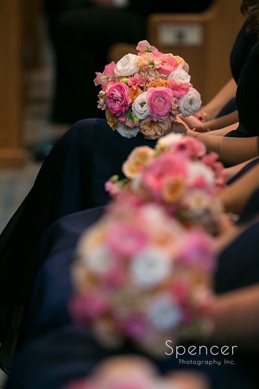  bridesmaids bouquets at Holy Rosary ceremony
