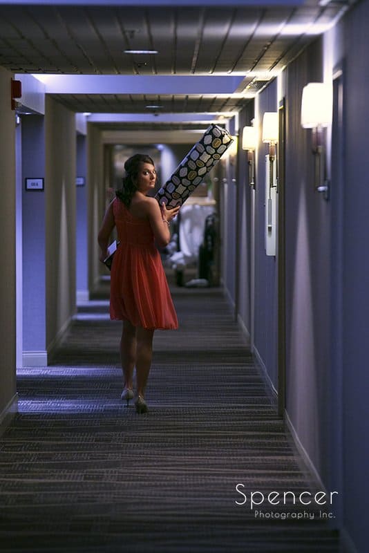 maid of honor walking down hall at Sheraton Suites