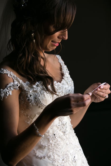 bride gets emotional reading note from groom