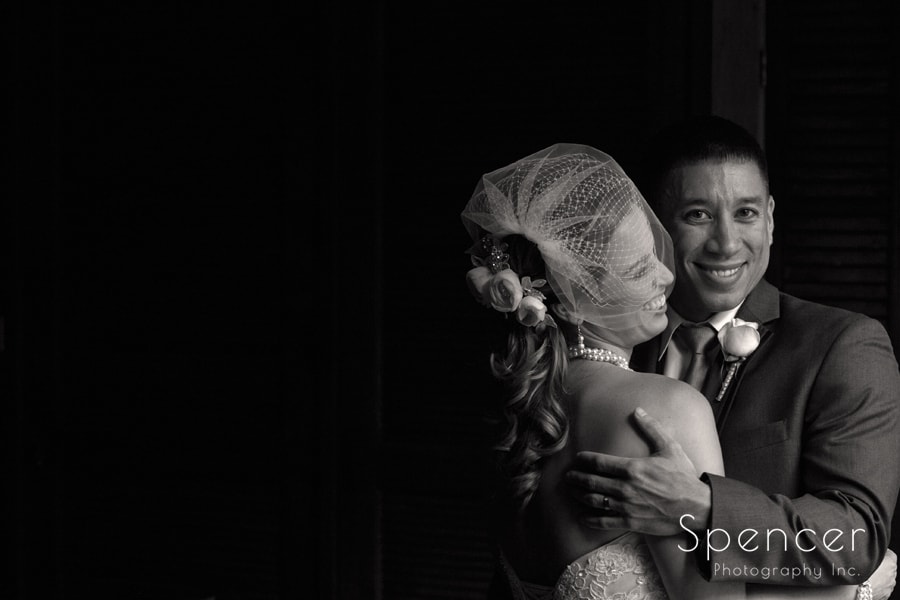 bride and groom hug after their wedding in Canton, Ohio