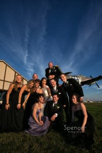 bridal party picture outside of wedding reception at 100th Bomb Group