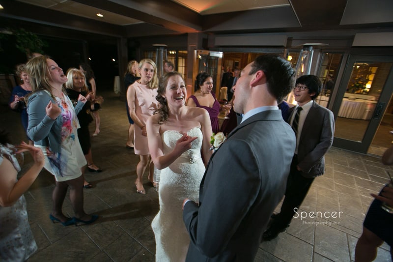 bride and groom dancing at their wedding reception at Mayfield Country Club