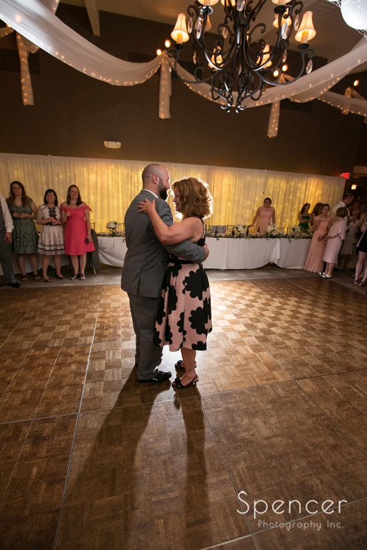  groom dancing with his mom at his wedding reception at tanglewood
