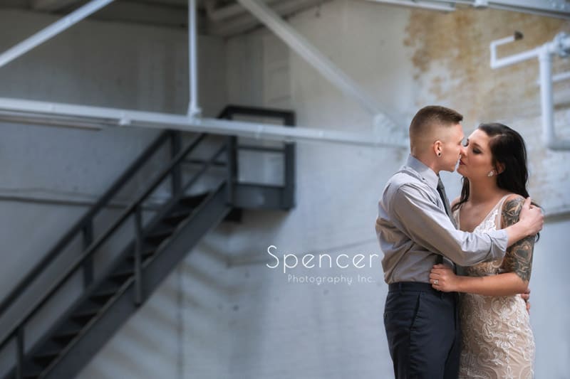 groom kissing bride at Madison Cleveland
