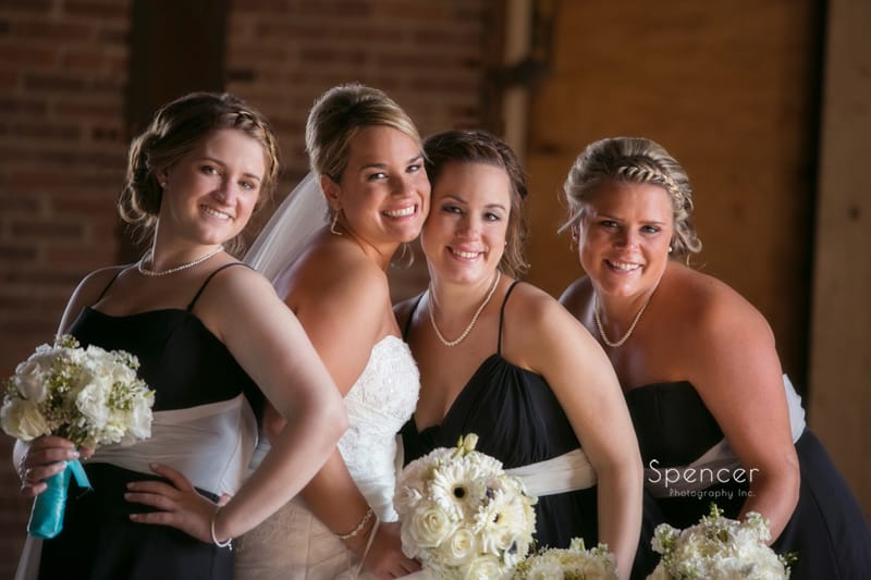 picture of bridesmaids grouped in Cleveland warehouse