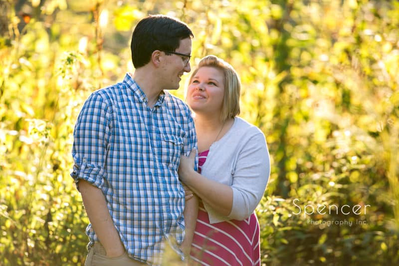 woman talking to man during their engagement pictures in akron