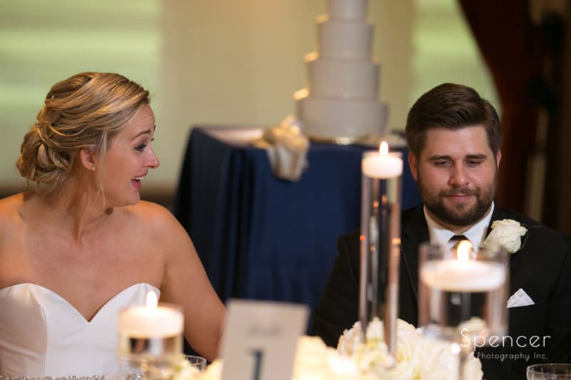 bride and groom at head table at firestone reception