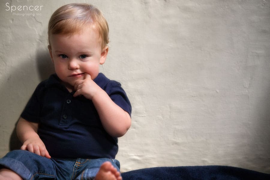 toddler sitting for his baby pictures