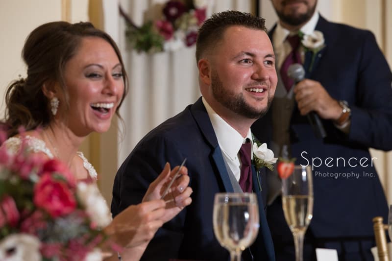 groom reacting to best man speech