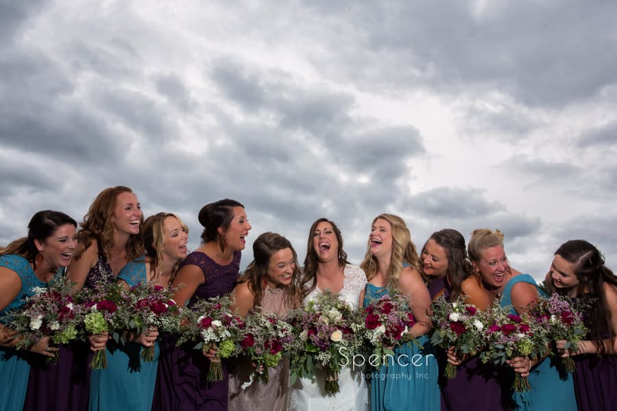  bridesmaids laughing at wedding at Occasions Party Center