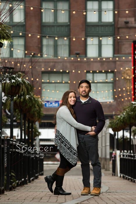 couple standing together for engagement picture on Cleveland East Fourth Street
