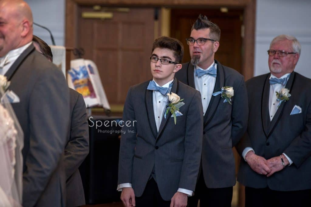 brides son watching mother get married