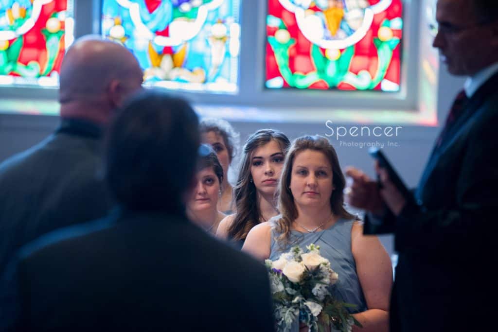 brides daughter watching mom get married