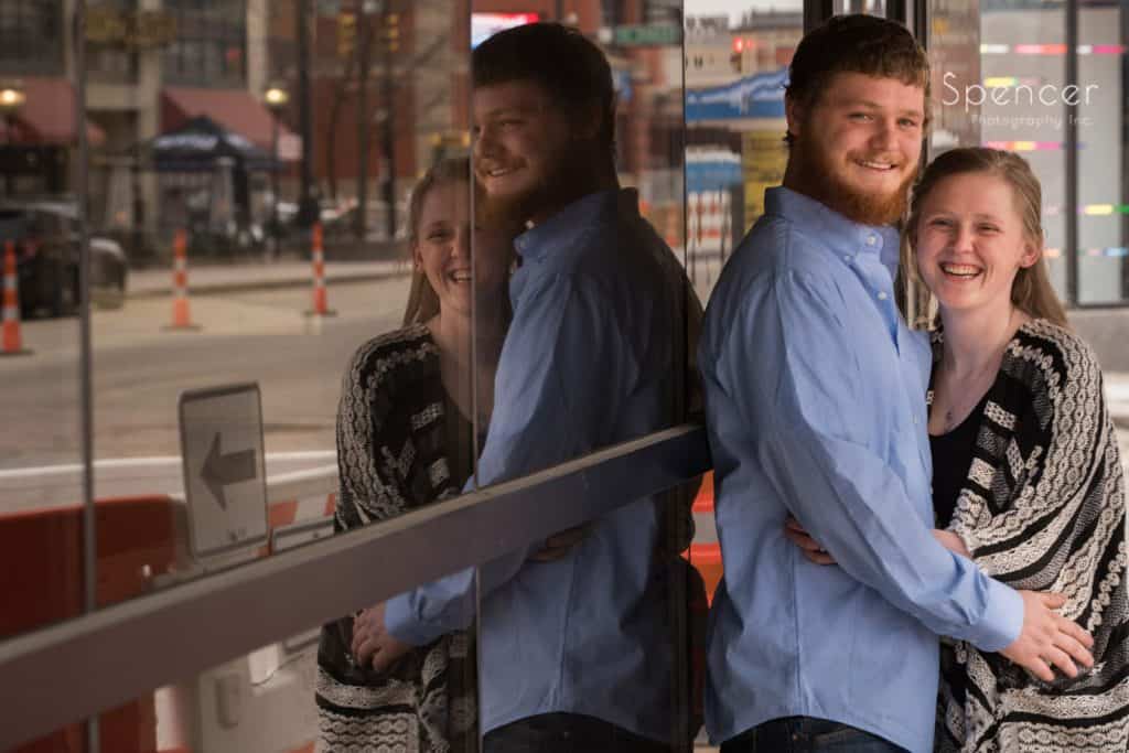 couple posing for engagement picture in Akron