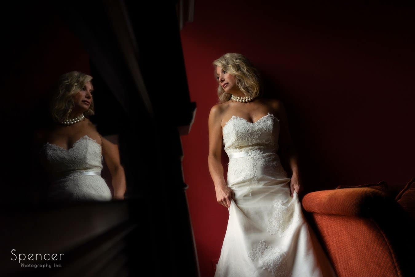 wedding picture of bride in suite at the Bertram Inn