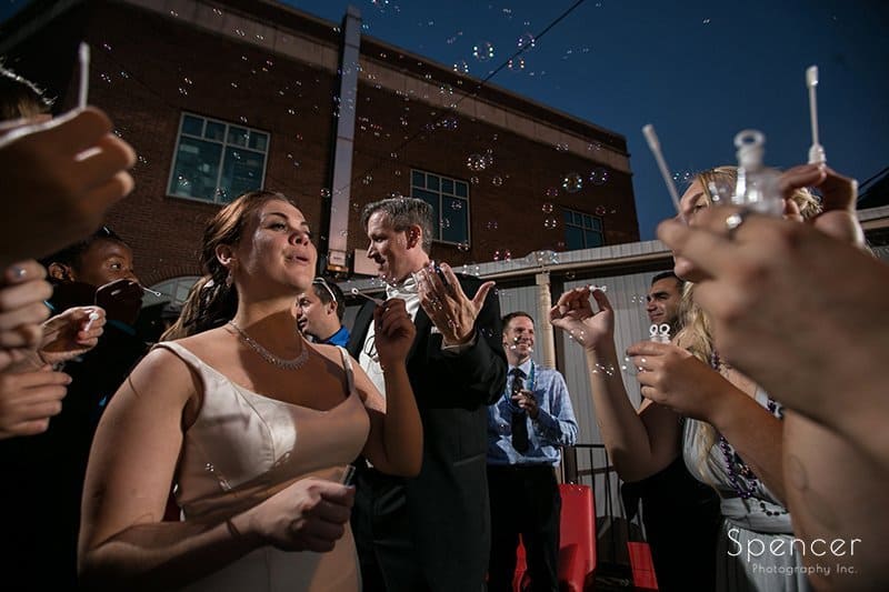 wedding reception guests playing with bubbles in Cleveland Heights
