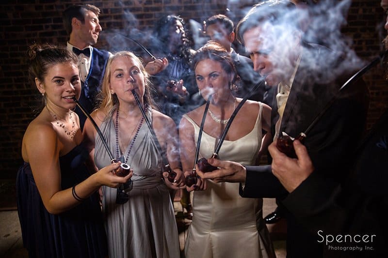 bridal party smoking pipes at wedding reception in Cleveland Heights