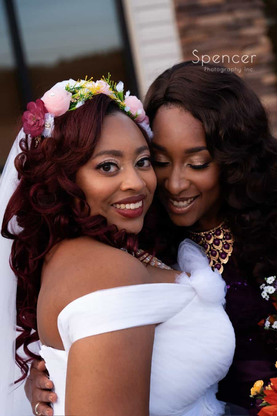 bride smiling with her sister
