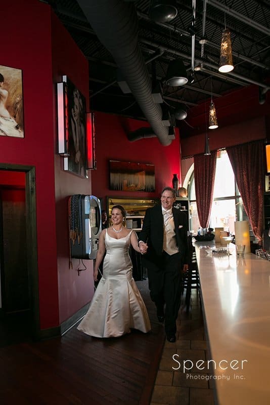 bride and groom enter their wedding reception in Cleveland Heights