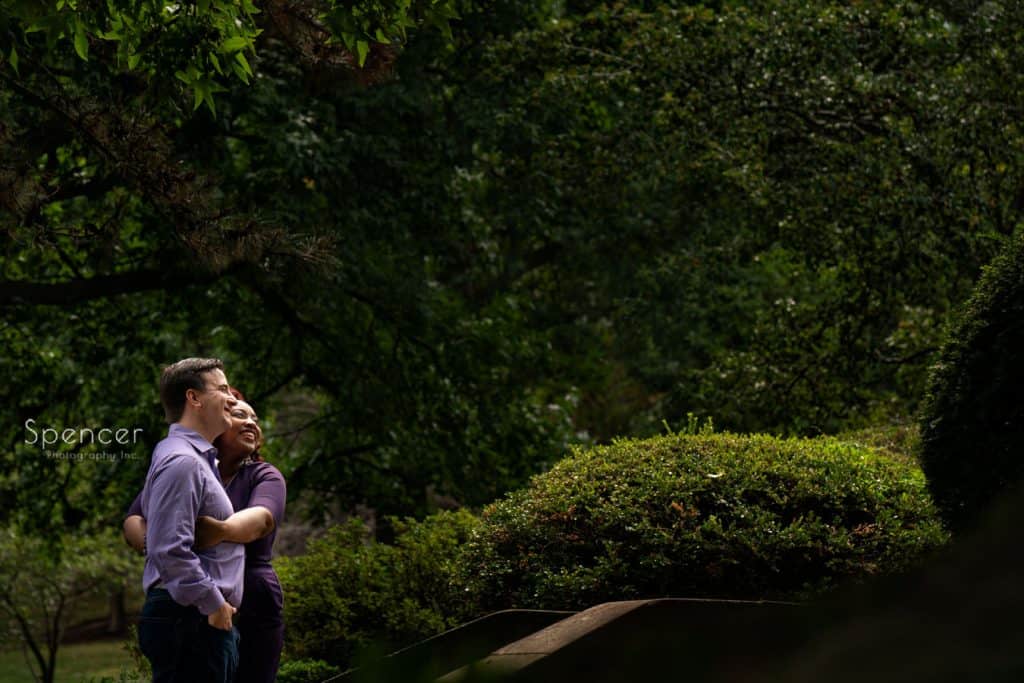 couple hugging during engagement pictures at Cleveland Museum of Art
