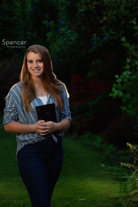 high school senior picture with girl holding bible