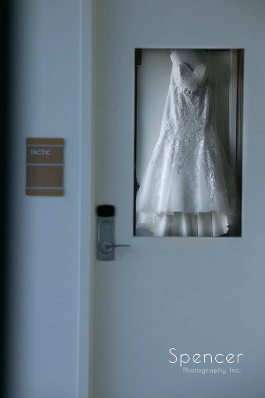 reflection of wedding dress on wedding day at Aloft Cleveland