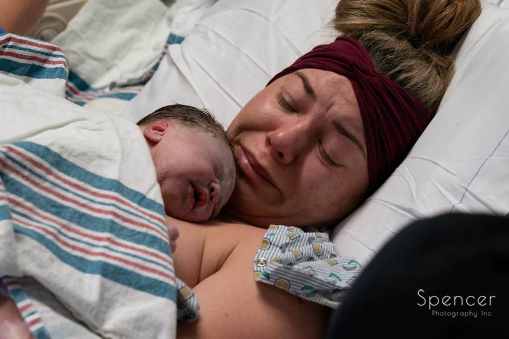 mother holding baby for first time