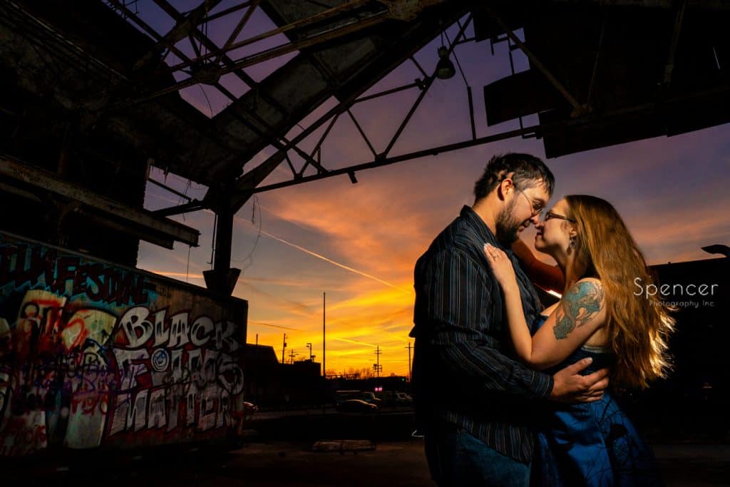 couple kissing in engagement pictures in Cleveland