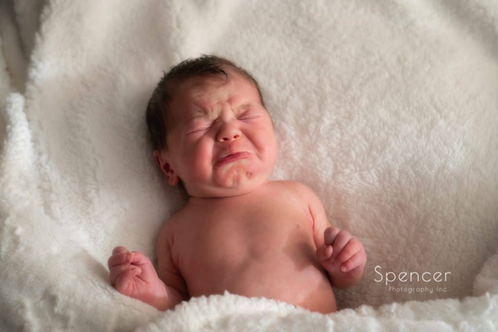 newborn photography baby crying