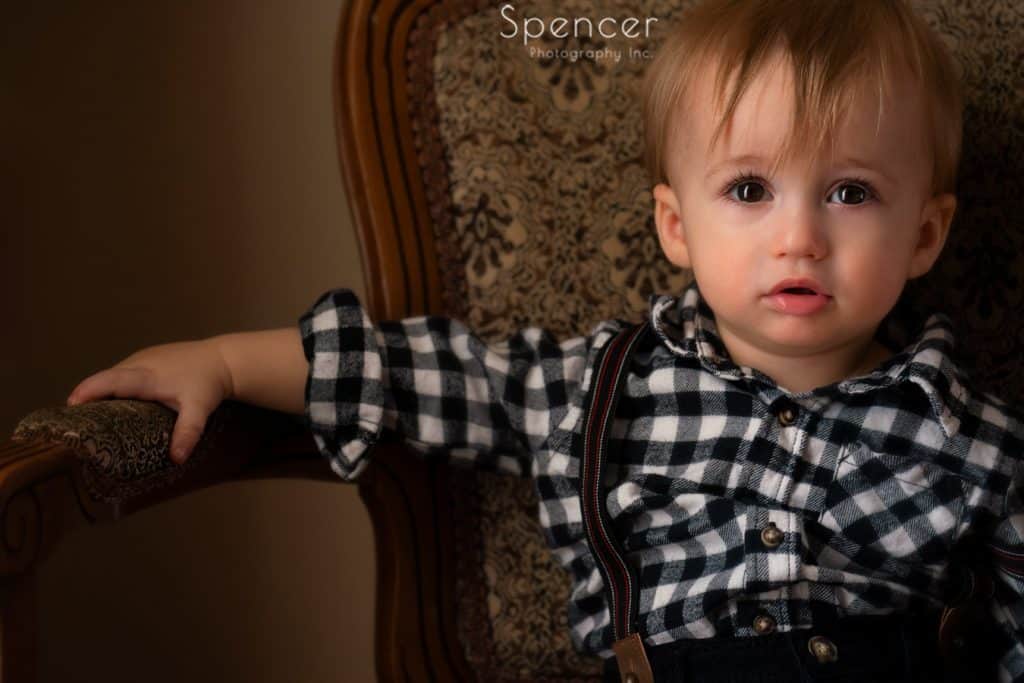 toddler photography of little boy in chair