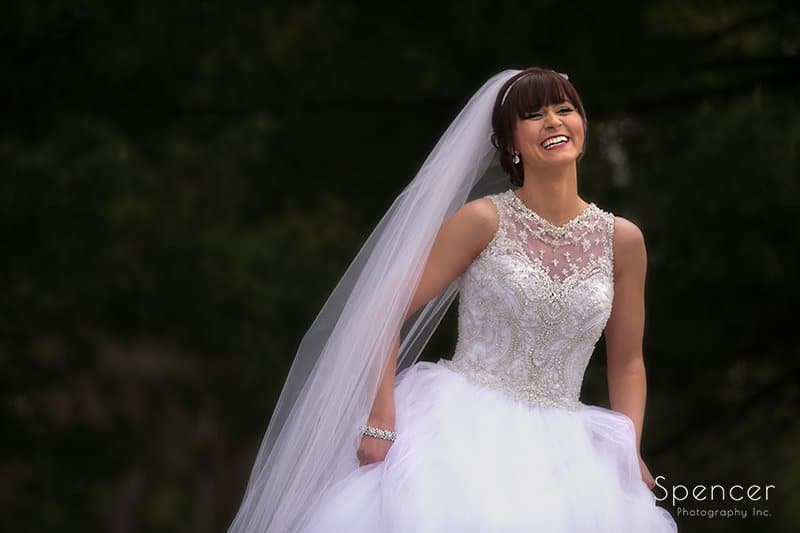 bride smiling in wedding photo