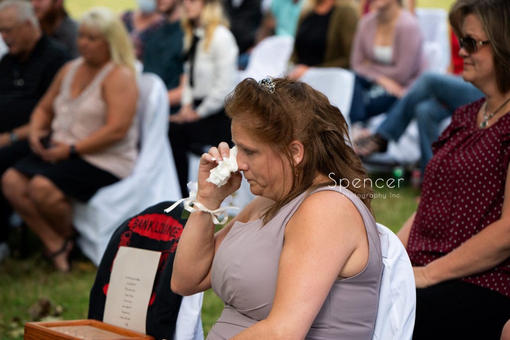 mom crying at sons wedding ceremony
