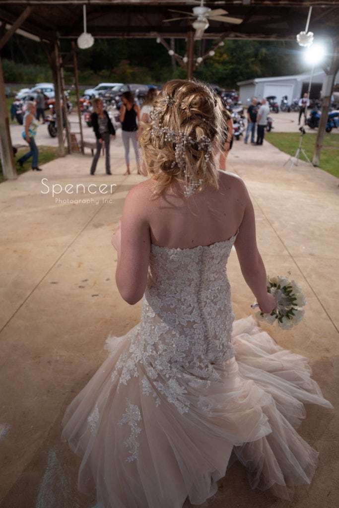 bride holding bouquet at wedding reception