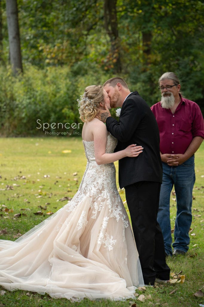 first kiss at akron wedding ceremony