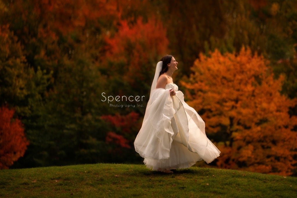  fall wedding picture of bride at wedding at stonewater
